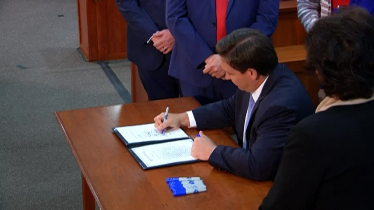 Gov. Ron DeSantis signs COVID-liability bill into law