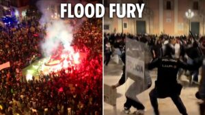 Riot Cops clash with raging Protesters hurling flares in Spain as Anger Erupts over flood deaths…. 11-10-2024